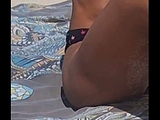 It was so hot at the beach that I had to take off my bikini.
