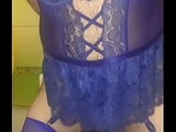 Crossdresser in blue lingerie fucks her ass with a dildo